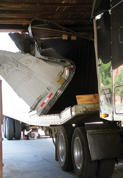 Railroad bridge claims another truck